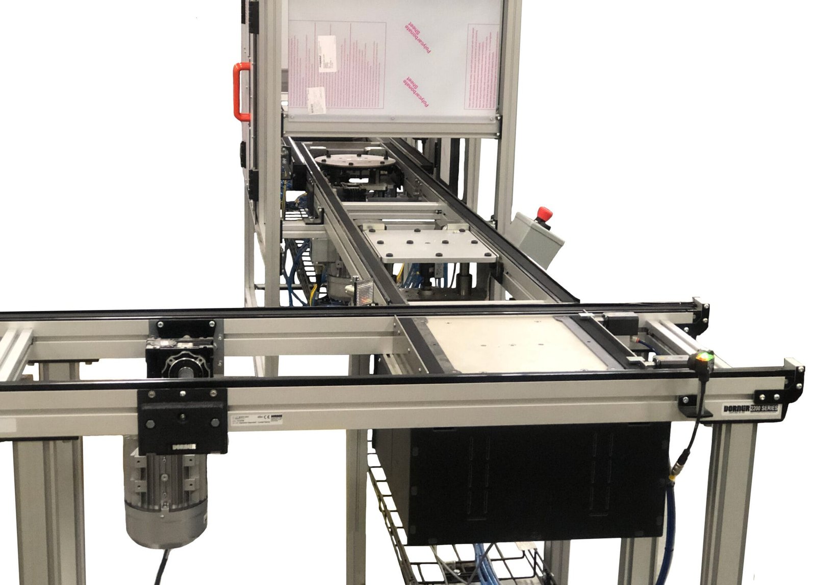 Conveyor system positioning product for a downstream process
