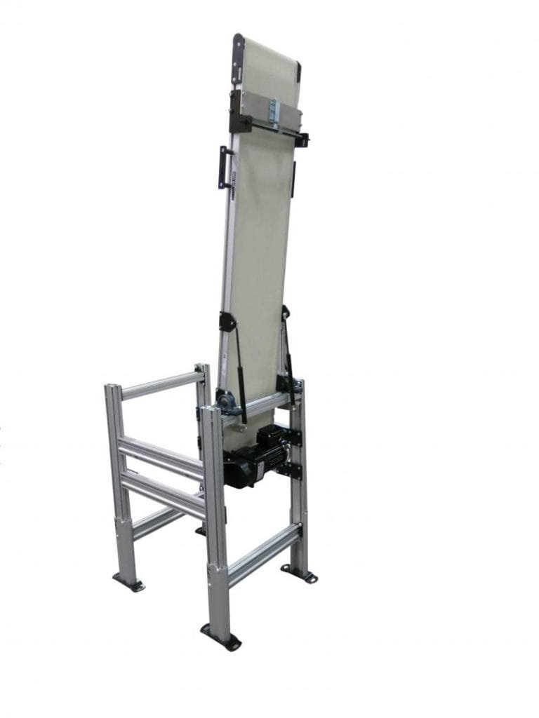 Vertical belt conveyor raised for elevation