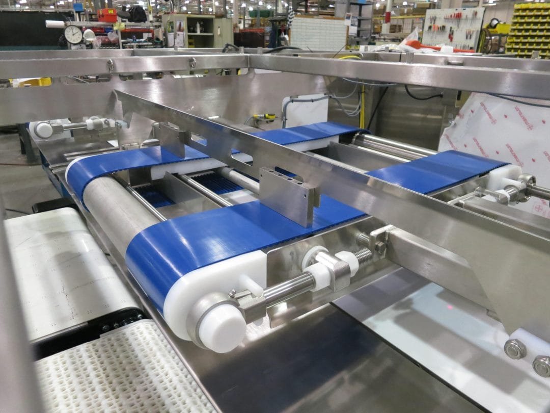 Precision conveyor within automated machinery