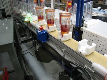 Conveyor controlling product spacing