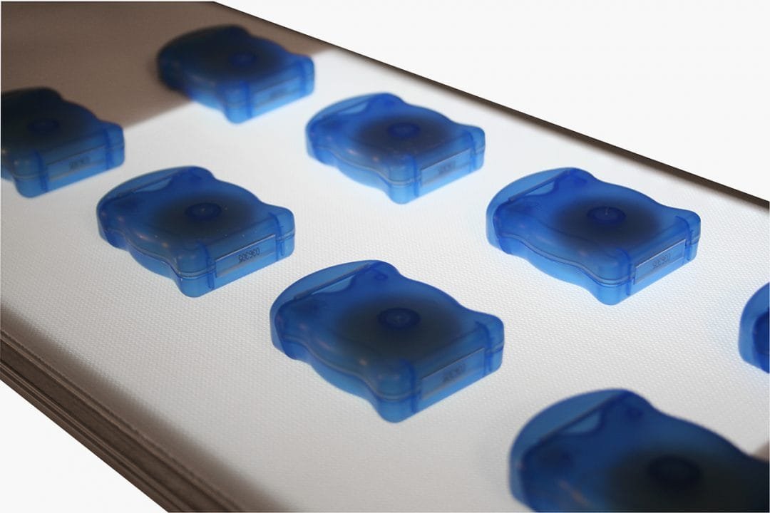 Backlit conveyor for inspection and testing