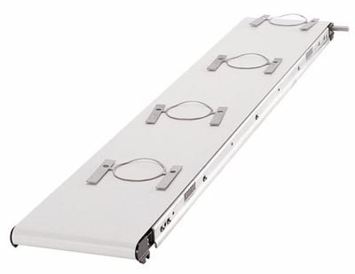 Magnetic bedplate built into a conveyor frame