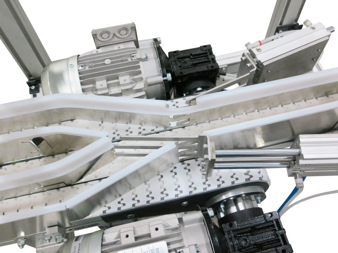 Products moving through a multi-lane sorting conveyor
