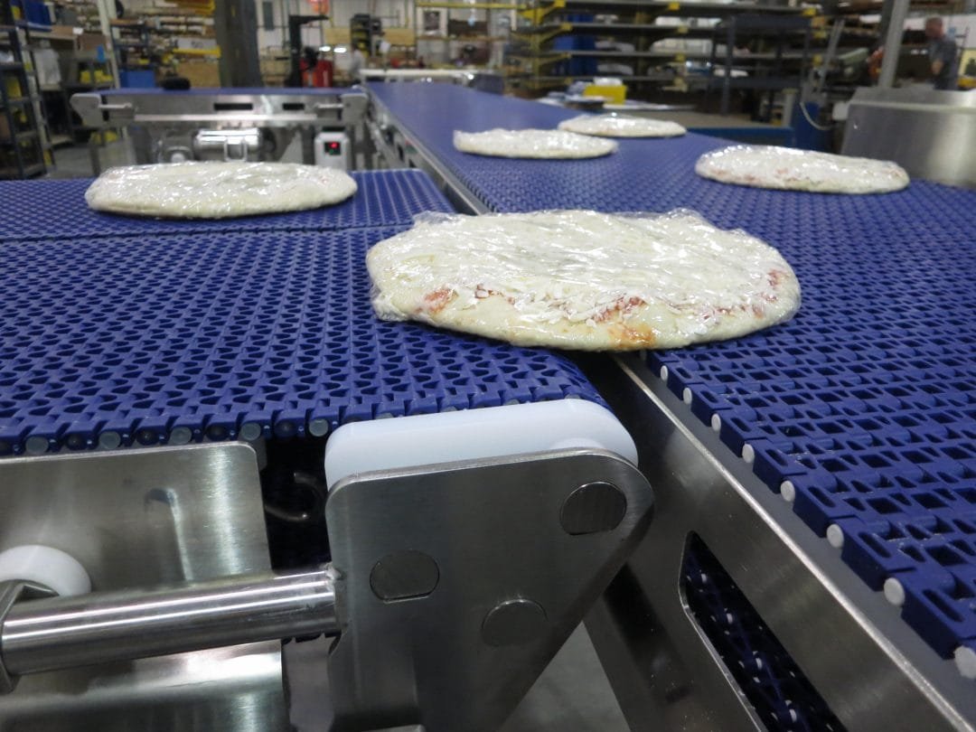 Food products merging between conveyors