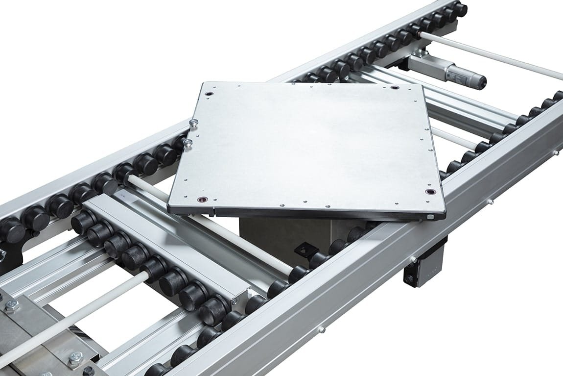 Pallet lift and rotating conveyor