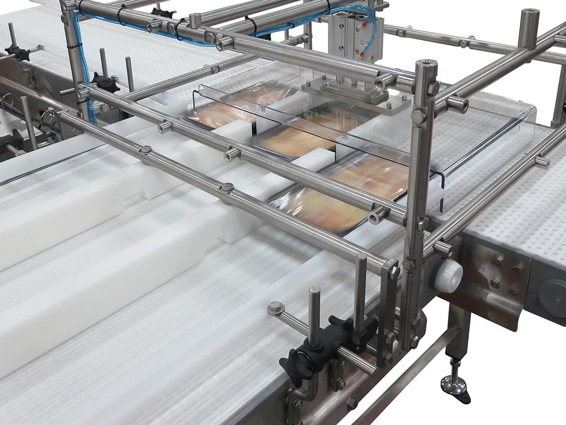 Three-lane sanitary product stager and transfer