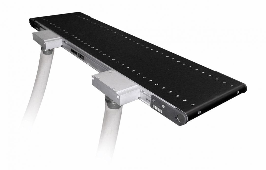 Vacuum chamber bed plate inside a conveyor frame